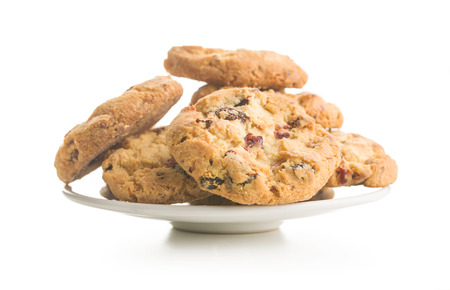 Sweet cookies with raisins isolated on white background.の写真素材