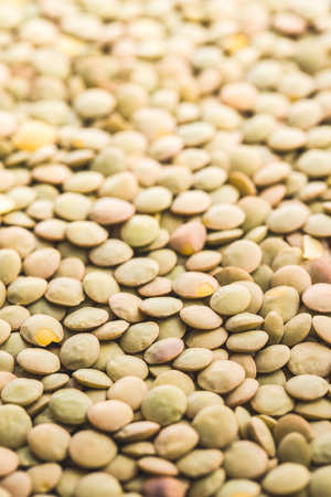 Uncooked dried lentil. Heathy food.の写真素材
