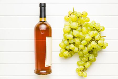 Tasty green grapes. White grape and white wine on table.の写真素材