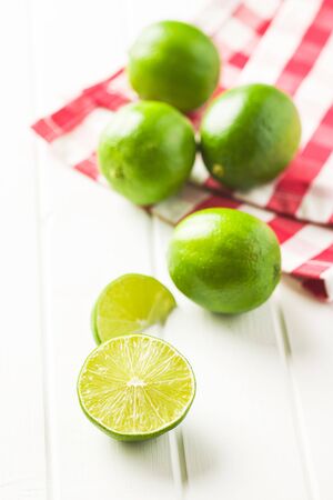 The green sliced lime on white table.の写真素材