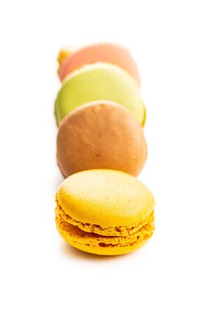 Sweet colorful macarons isolated on white background.の写真素材