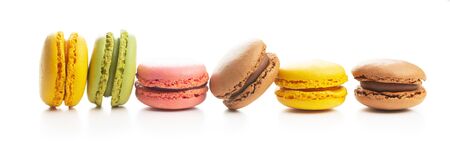 Sweet colorful macarons isolated on white background.の写真素材