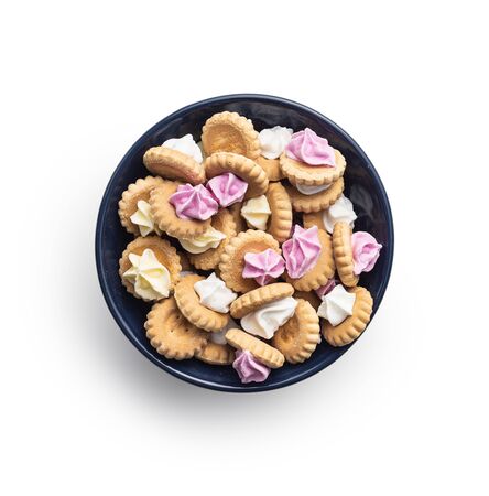 Sweet mini dessert cookies in bowl isolated on white background.の写真素材