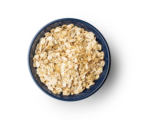 Cereal oatmeal in bowl isolated on white background.の写真素材