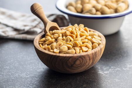 Roasted salted peanuts. Crispy nuts in bowl.