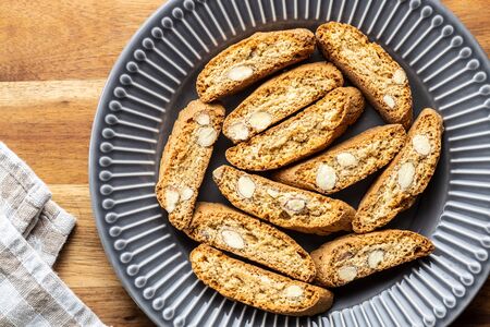Sweet italian cantuccini cookies. Almonds biscuits on plate. Top view.の写真素材