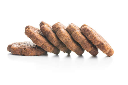 Sweet cookies. Crunchy chocolate biscuits shape flower isolated on white background.の写真素材