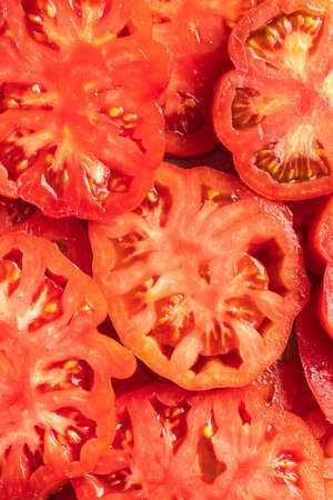 Slced red beefsteak tomatoes. Top view.