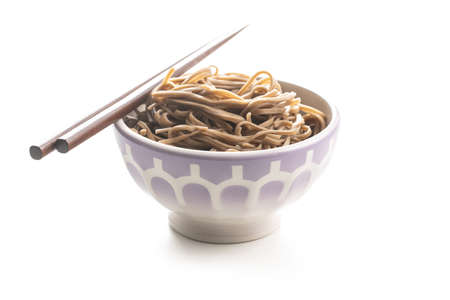 Cooked room noodles. Traditional asian pasta in bowl isolated on white background.