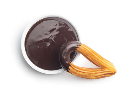 Tasty fried churros with chocolate dip isolated on white background.