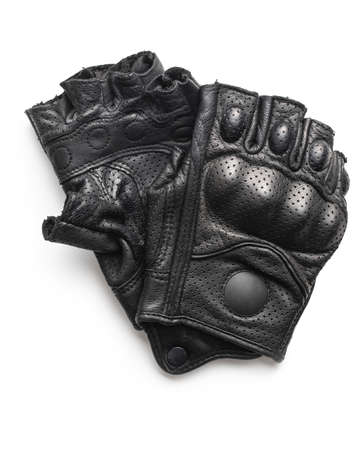 Black motorcycle leather half-finger gloves isolated on white background.の写真素材