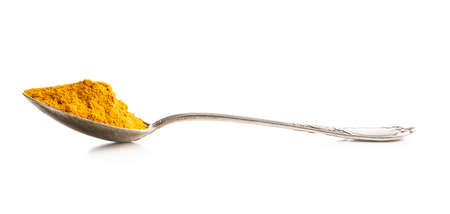 Indian turmeric powder. Turmeric spice. Ground turmeric isolated on white background.の写真素材