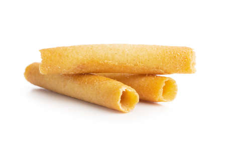 Sweet waffle tubes rolls isolated on a white background.