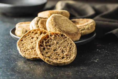 Toast bread buns on black table.