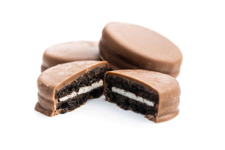 Biscuits with chocolate icing isolated on white background.