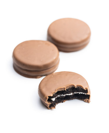 Biscuits with chocolate icing isolated on white background.の写真素材