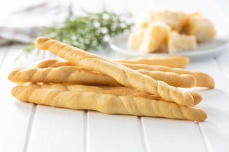 Grissini sticks. Traditional italian bread sticks on white table.