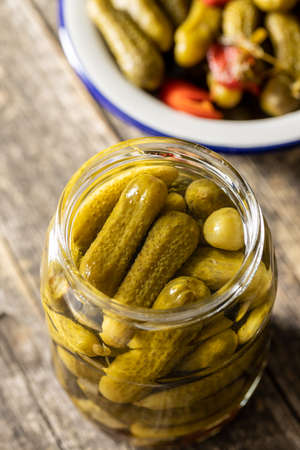Marinated pickles. Canned cucumbers in jar.の写真素材