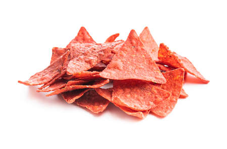 Salted tortilla chips triangle with red beet flavor isolated on white background.の写真素材