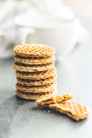 Sweet caramel mini waffles on kitchen table.の写真素材