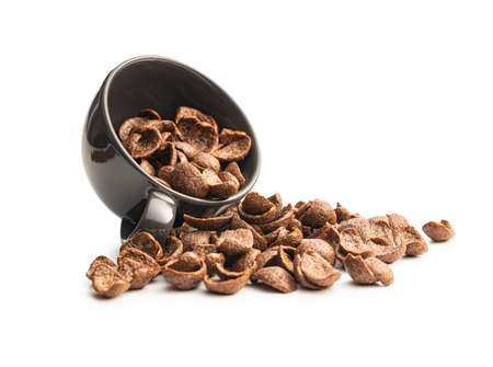Sweet chocolate breakfast cereal flakes isolated on white background.の写真素材