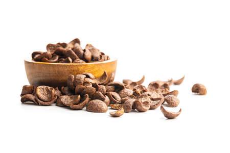 Sweet chocolate breakfast cereal flakes isolated on white background.