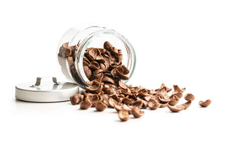 Sweet chocolate breakfast cereal flakes in jar isolated on white background.