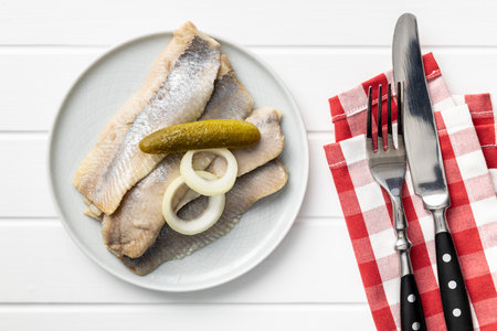 Marinated herring fish on the plate. Top view.の写真素材