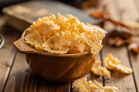 Halloween crispy bat shaped chips in the bowl.