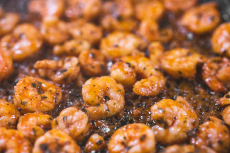 Grilled tiger shrimps on the hot pan.の写真素材