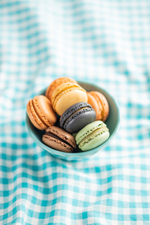 Sweet macaron dessert. Colorful macarons in bowl.の写真素材