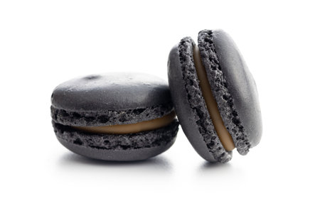 Sweet macaron dessert. Macarons isolated on the white background.の写真素材