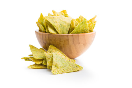 Tortilla chips with the flavor of jalapeno peppers in a bowl isolated on the white background.の写真素材