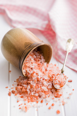 Pink Himalayan salt on the kitchen table.