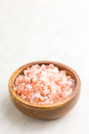 Pink Himalayan salt in a bowl.の写真素材