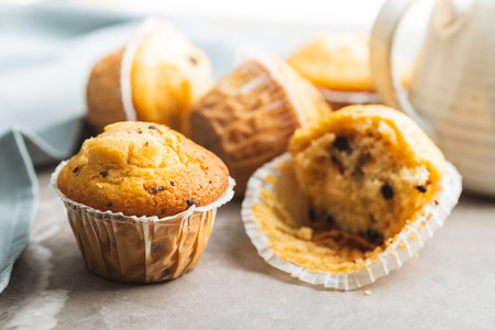 Sweet vanilla muffins on the kitchen table.の写真素材