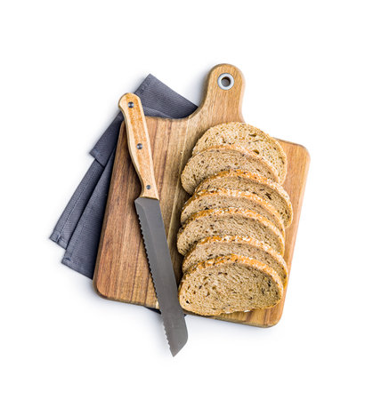 Sliced whole grain bread. Tasty wholegrain pastry with seeds isolated on the white background.