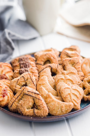 Assorted various cookies. Sweet biscuits on the plate.の写真素材