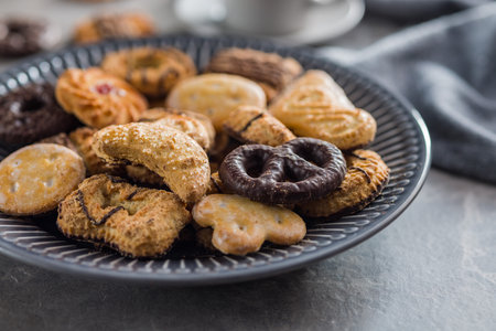 Assorted various cookies. Sweet biscuits on the plate.の写真素材