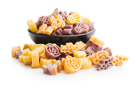 Pasta of various scary shapes. Uncooked Halloween pasta isolated on the white background.の写真素材