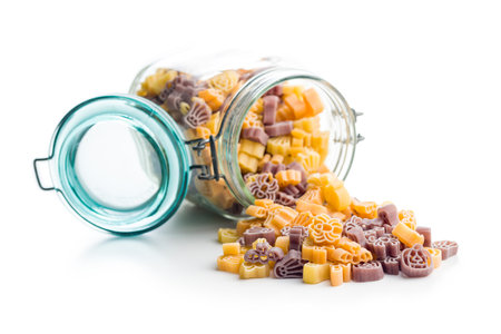 Pasta of various scary shapes in spring. Uncooked Halloween pasta isolated on the white background.の写真素材