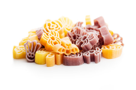 Pasta of various scary shapes. Uncooked Halloween pasta isolated on the white background.の写真素材