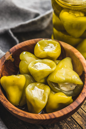 Peppers stuffed with cream cheese in the bowl.の写真素材