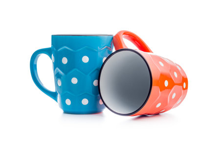 The polka dot mugs isolated on the white background.の写真素材