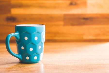 The polka dot mugs on the kitchen table.の写真素材