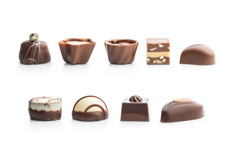 Sweet chocolate pralines. Tasty chocolate truffles isolated on the white background.の写真素材