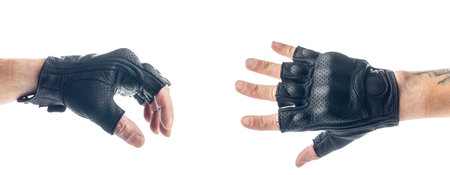 Motorcycle leather fingerless gloves on hand isolated on the white background.の写真素材