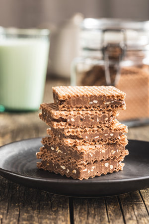 Sweet chocolate wafer on the plate.の写真素材