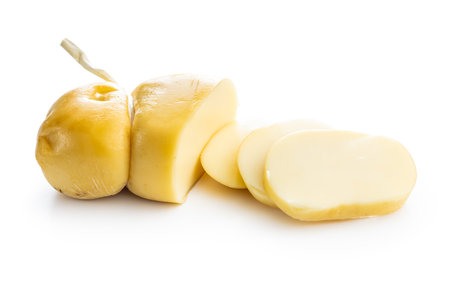 Smoked scamorza cheese isolated on the white background.の写真素材