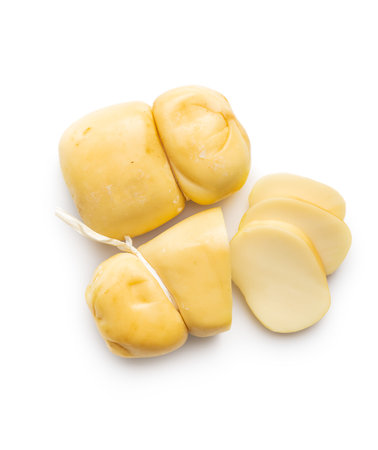 Smoked scamorza cheese isolated on the white background.の写真素材